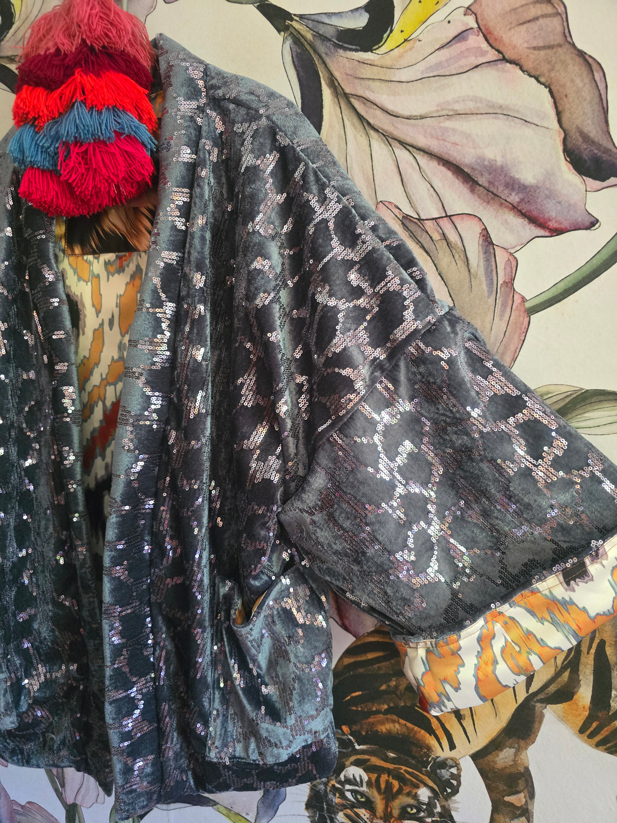 The SEQUINS BLUE & IKAT REVERSIBLE BOMBER