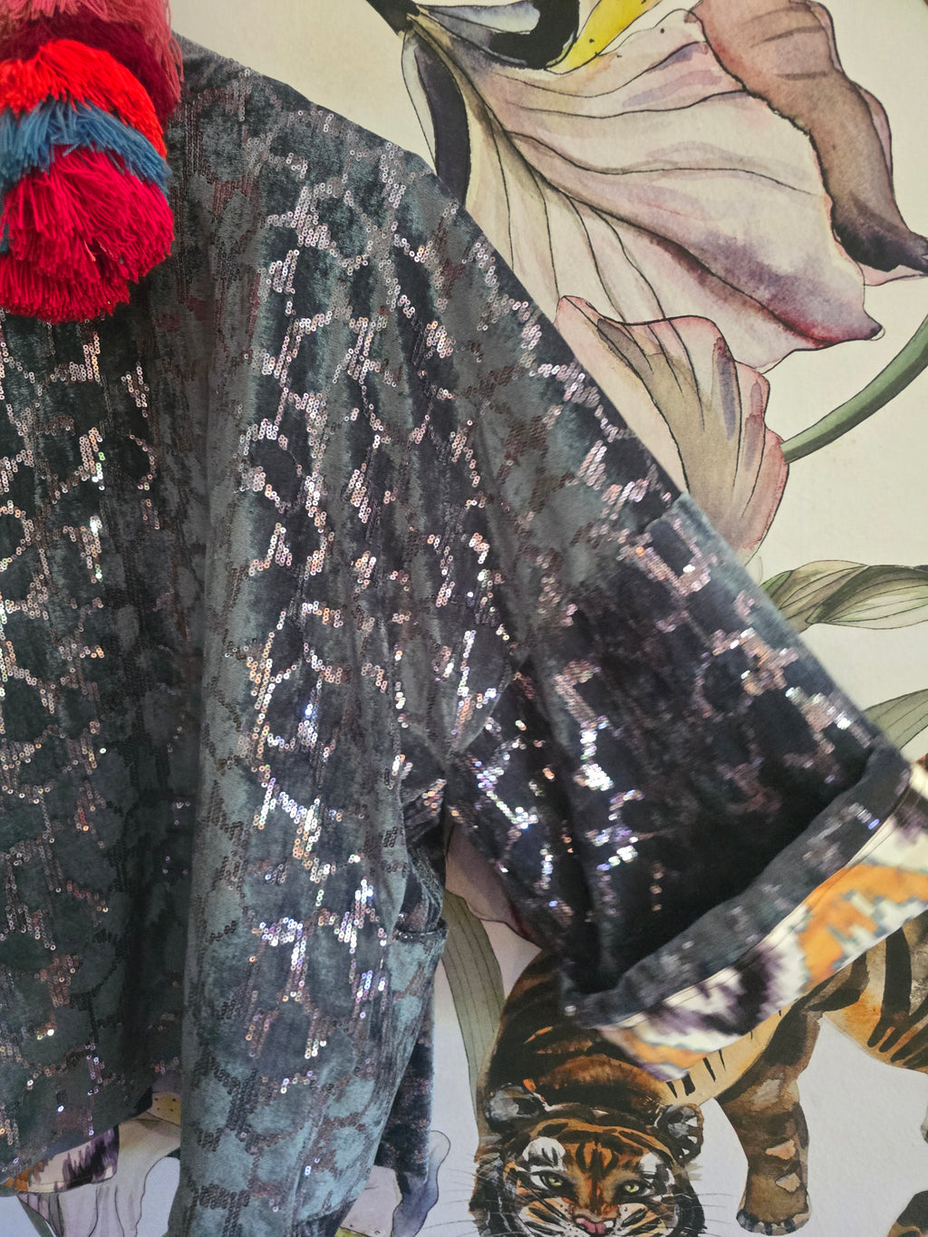 The SEQUINS BLUE & IKAT REVERSIBLE BOMBER