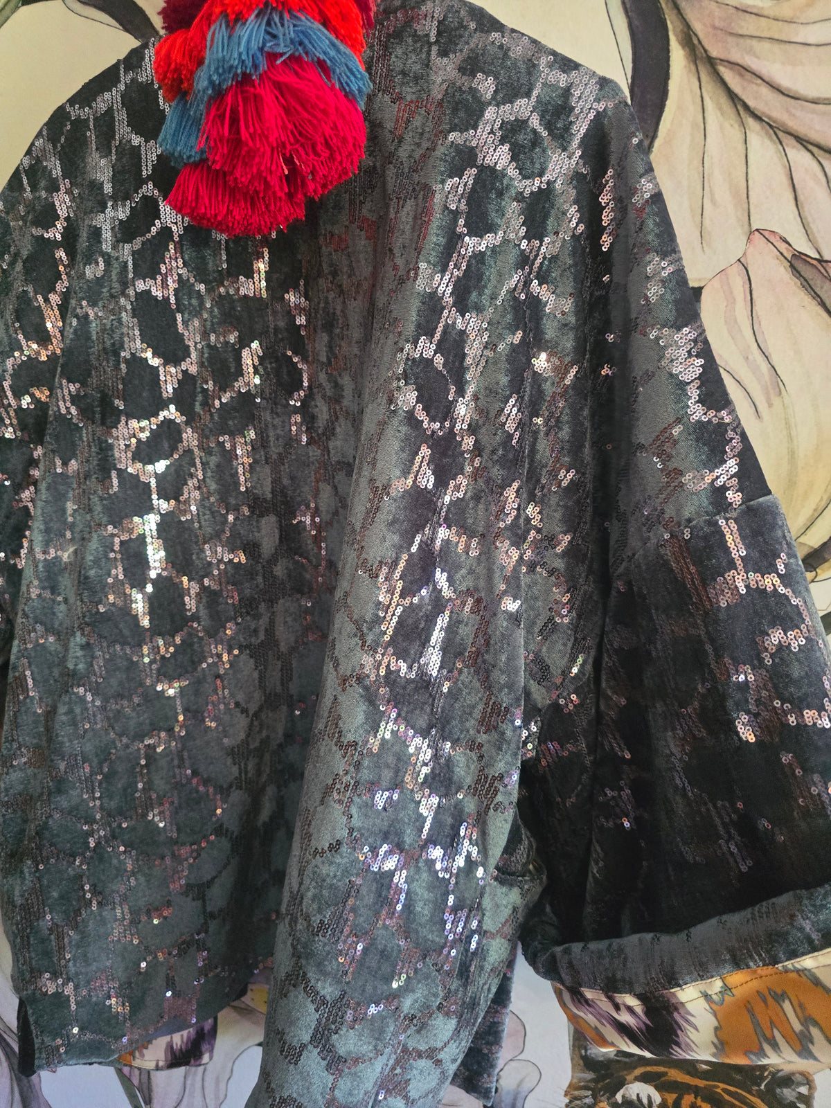 The SEQUINS BLUE & IKAT REVERSIBLE BOMBER
