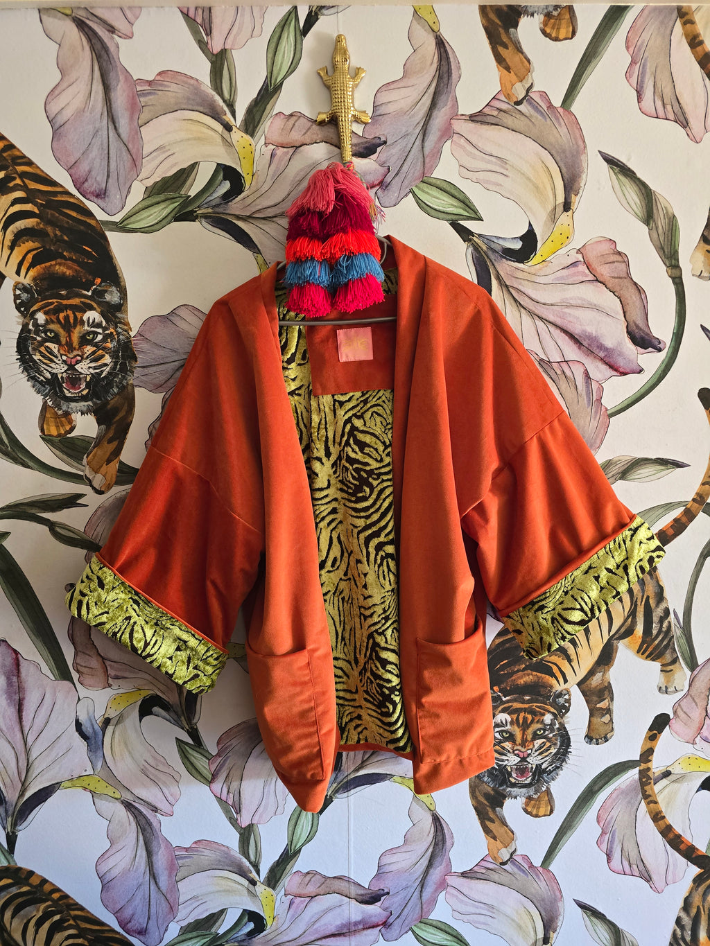 The ORIENTAL CUT OUT VELVET WITH ORANGE REVERSE KIMONO JACKET