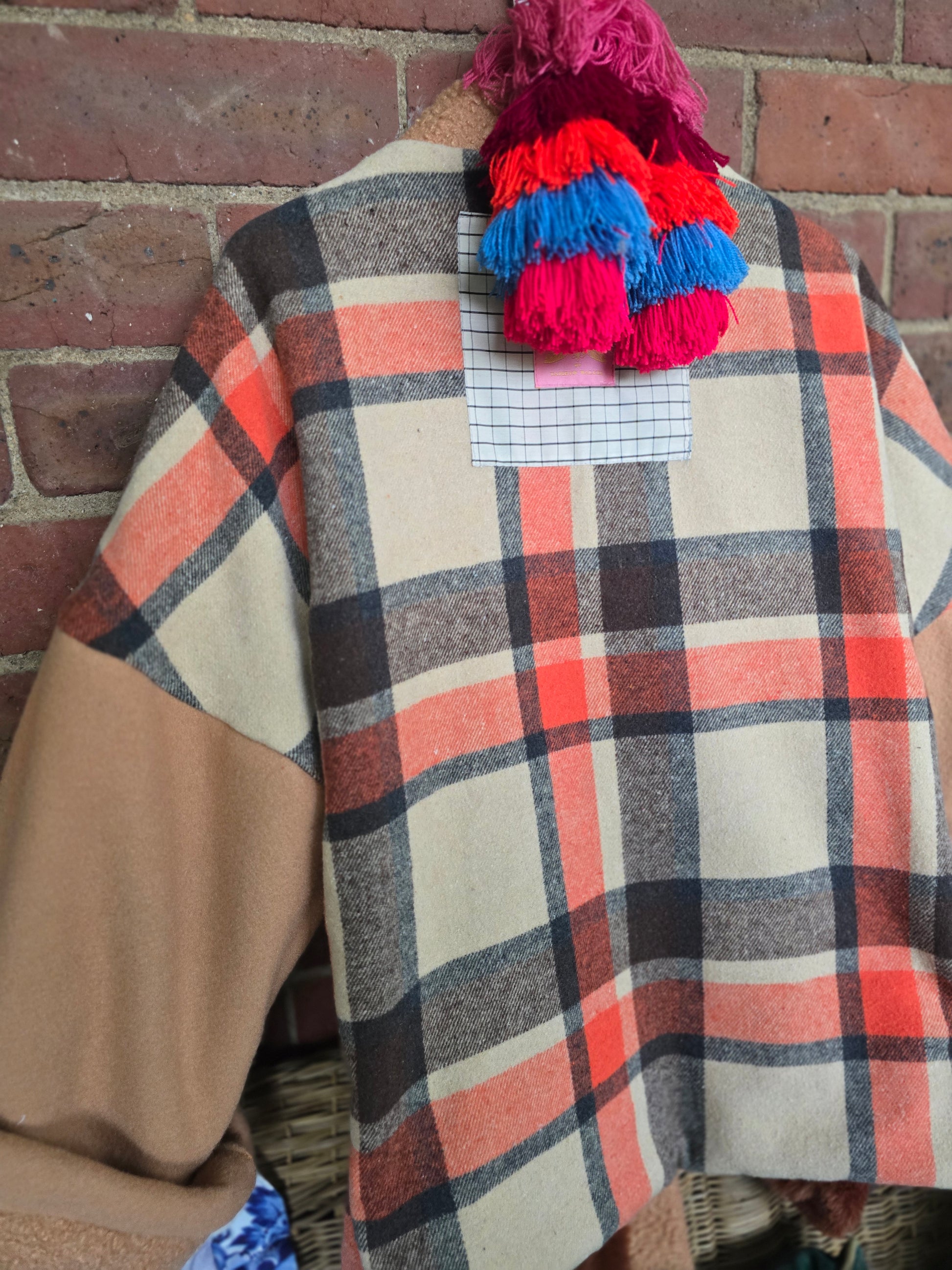 The LUMBER JILL REVERSIBLE FAUX FUR JACKET