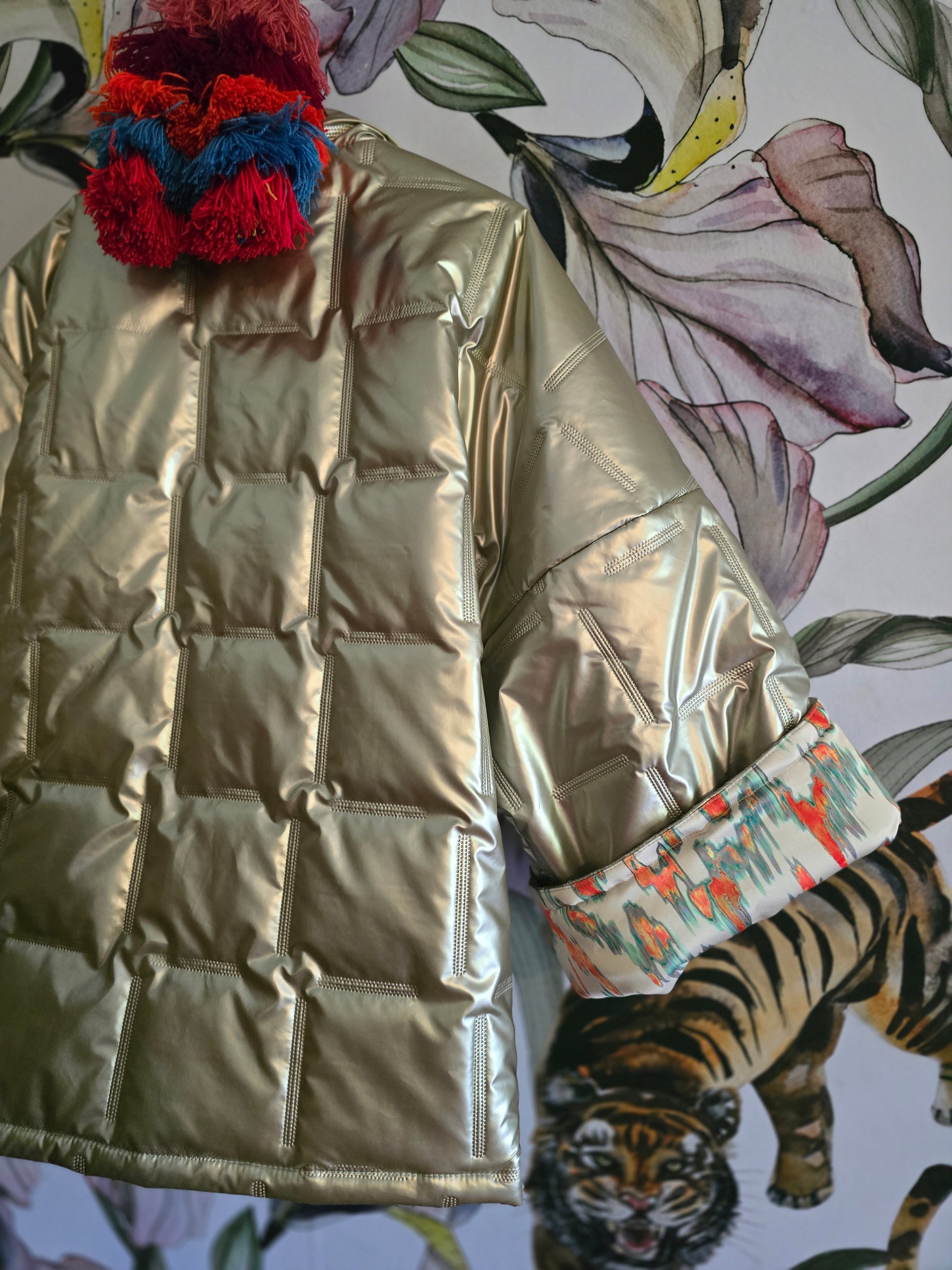The COOL MOM REVERSIBLE PUFFER IN PEWTER & IKAT ( ONLY ONE )