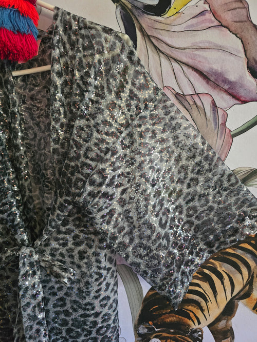 The LEOPARD CARDIE IN SEQUINS.