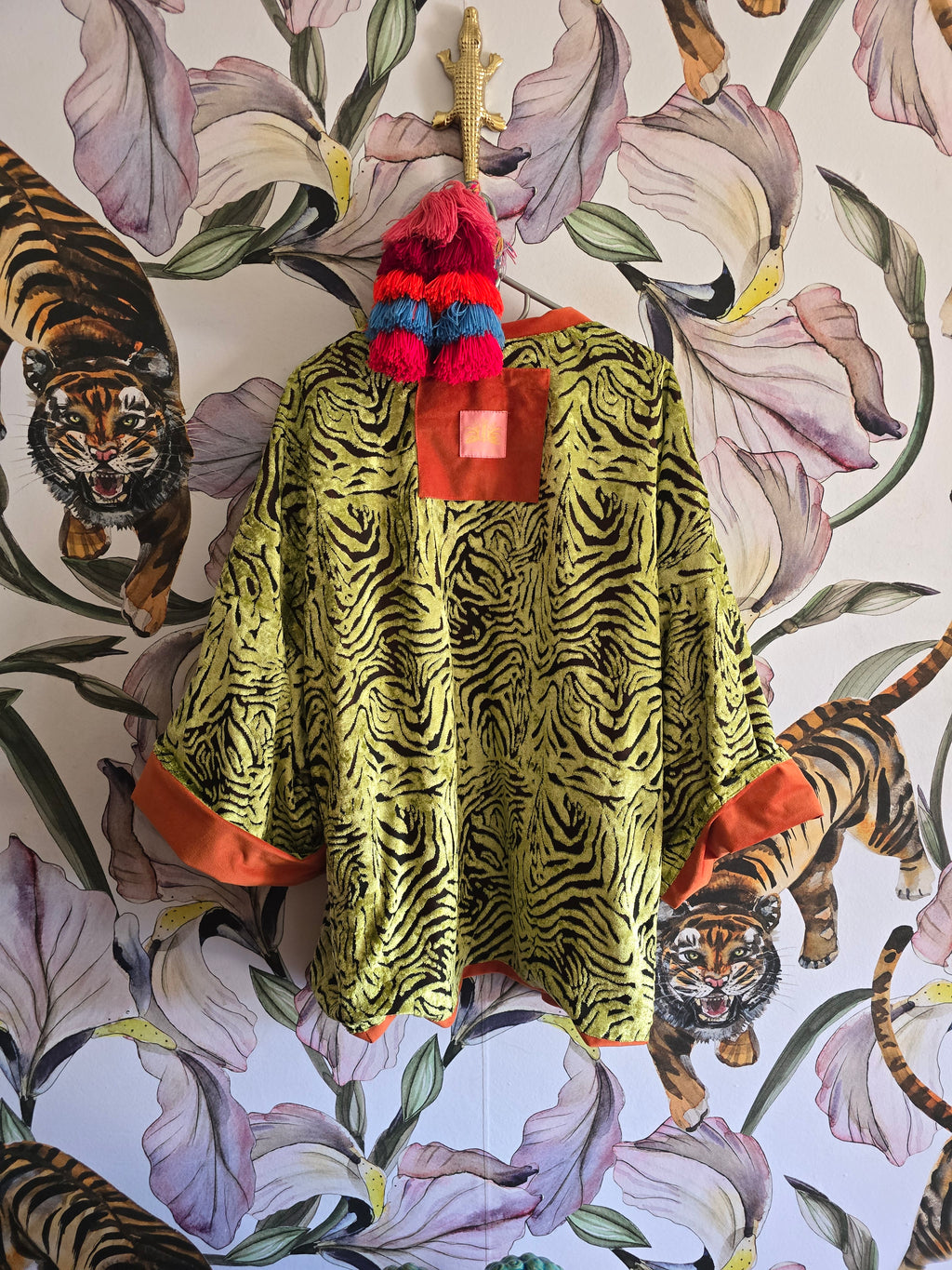 The ORIENTAL CUT OUT VELVET WITH ORANGE REVERSE KIMONO JACKET