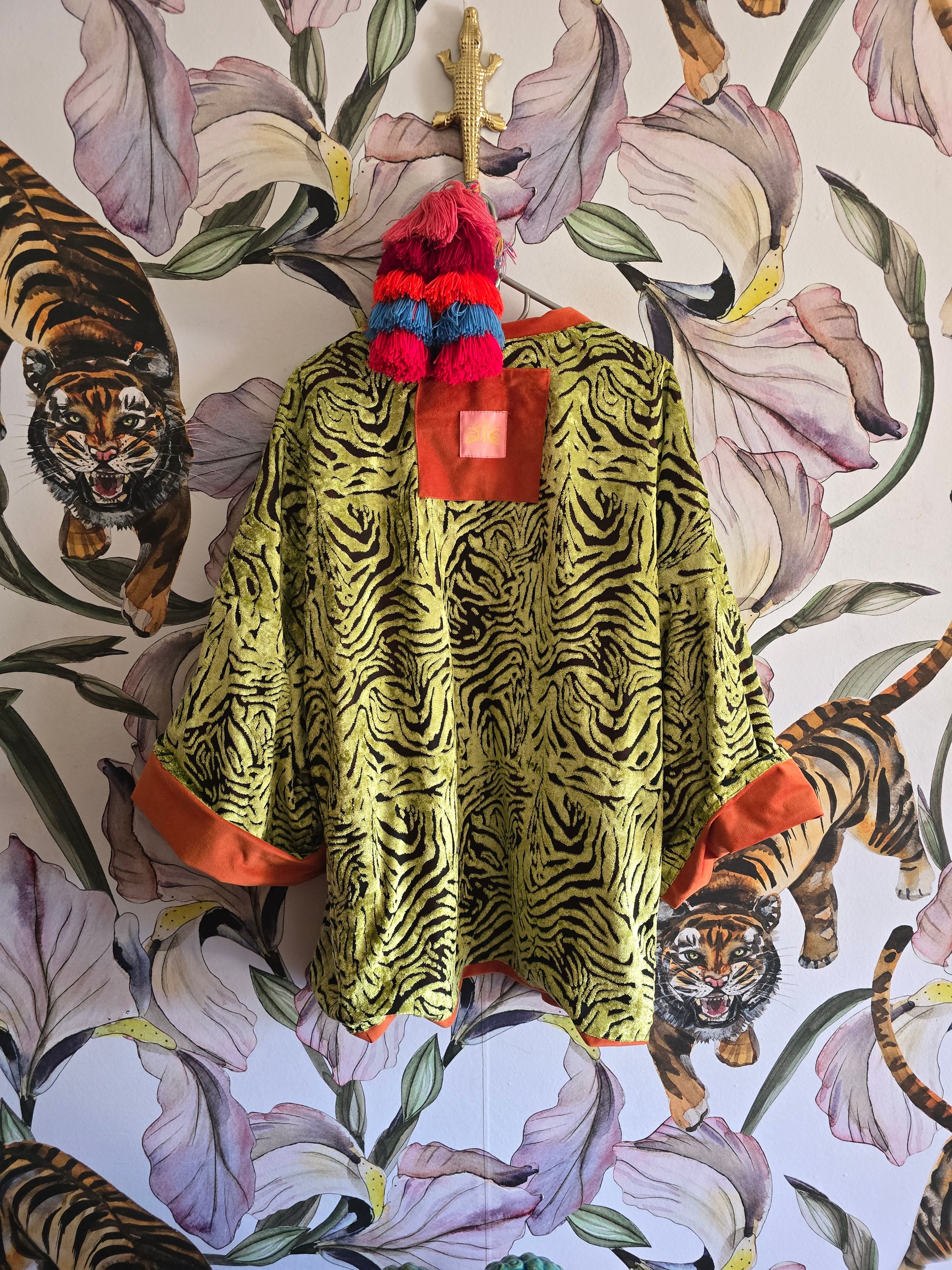 The ORIENTAL CUT OUT VELVET WITH ORANGE REVERSE KIMONO JACKET