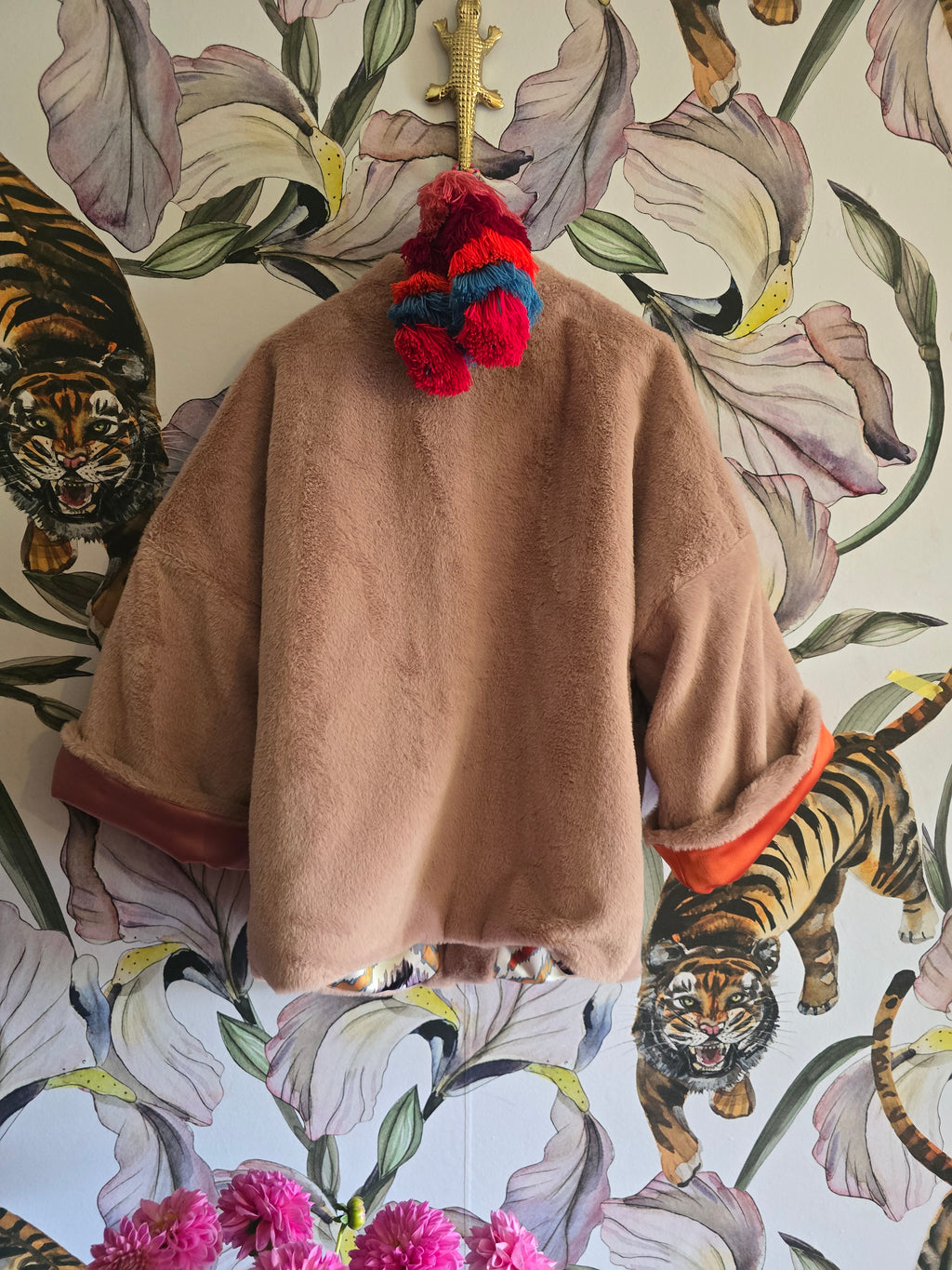 The BLUSHING BABE REVERSIBLE FAUX FUR BOMBER WITH IKAT