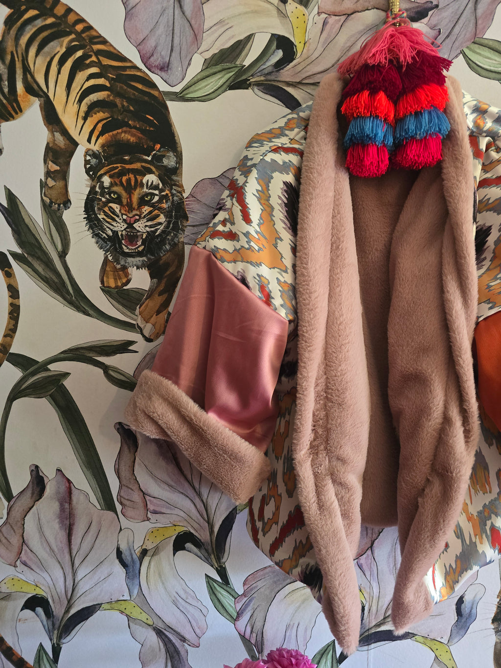 The BLUSHING BABE REVERSIBLE FAUX FUR BOMBER WITH IKAT