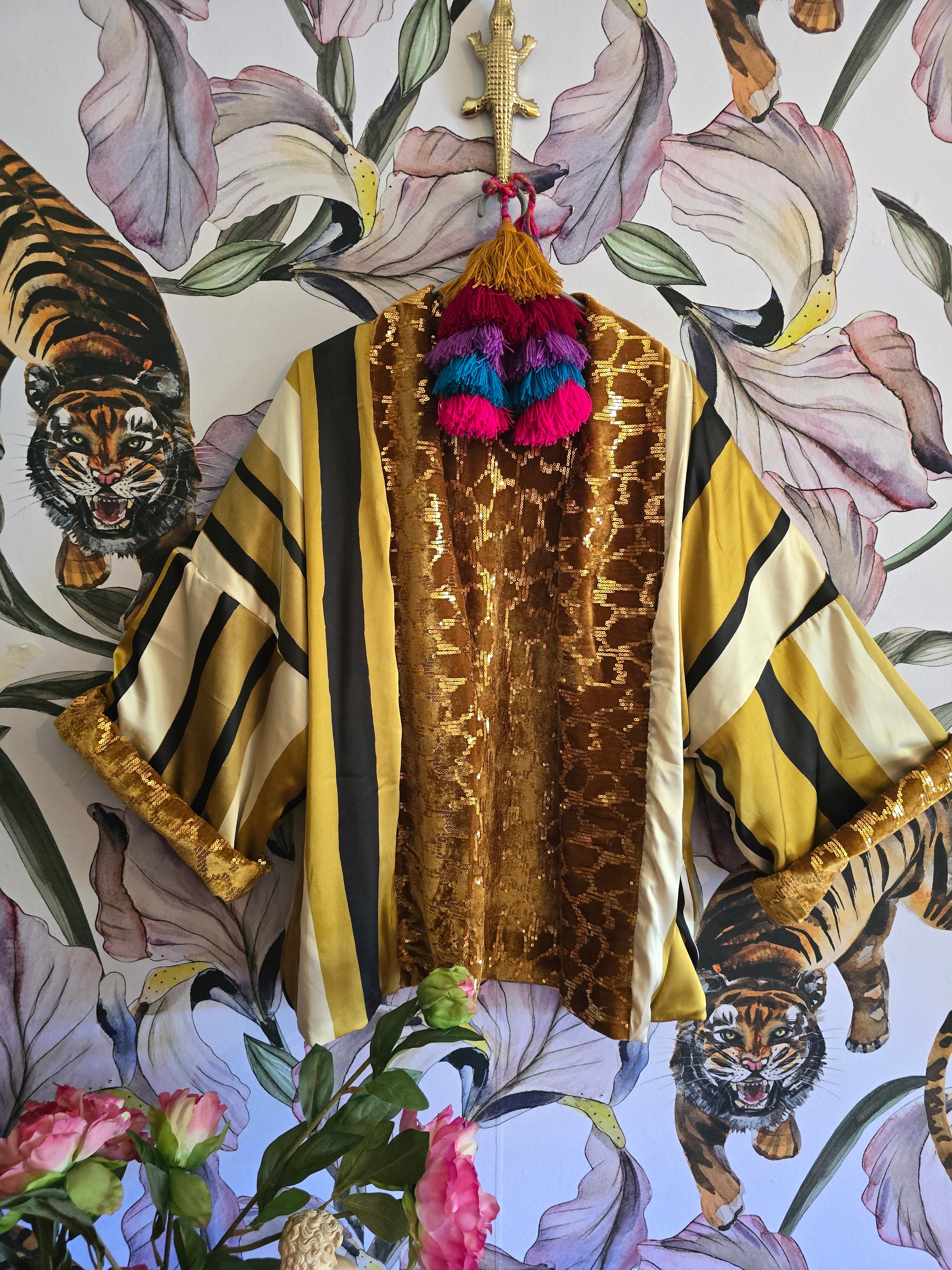 The reversible sparkle and velvet bomber gold