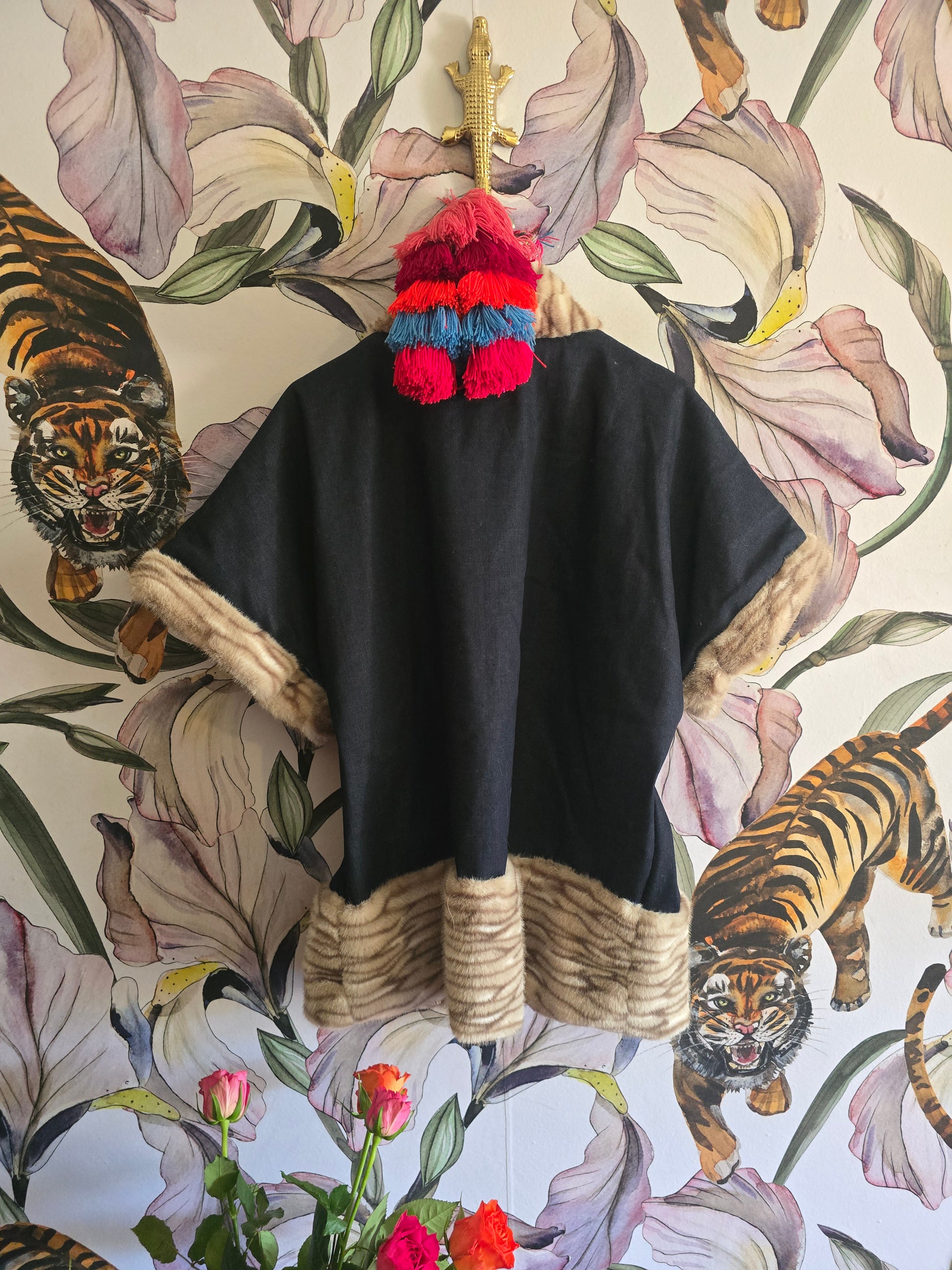 The DENIM & FAUX FUR REVERSIBLE BOLERO WITH CHECK LINING.