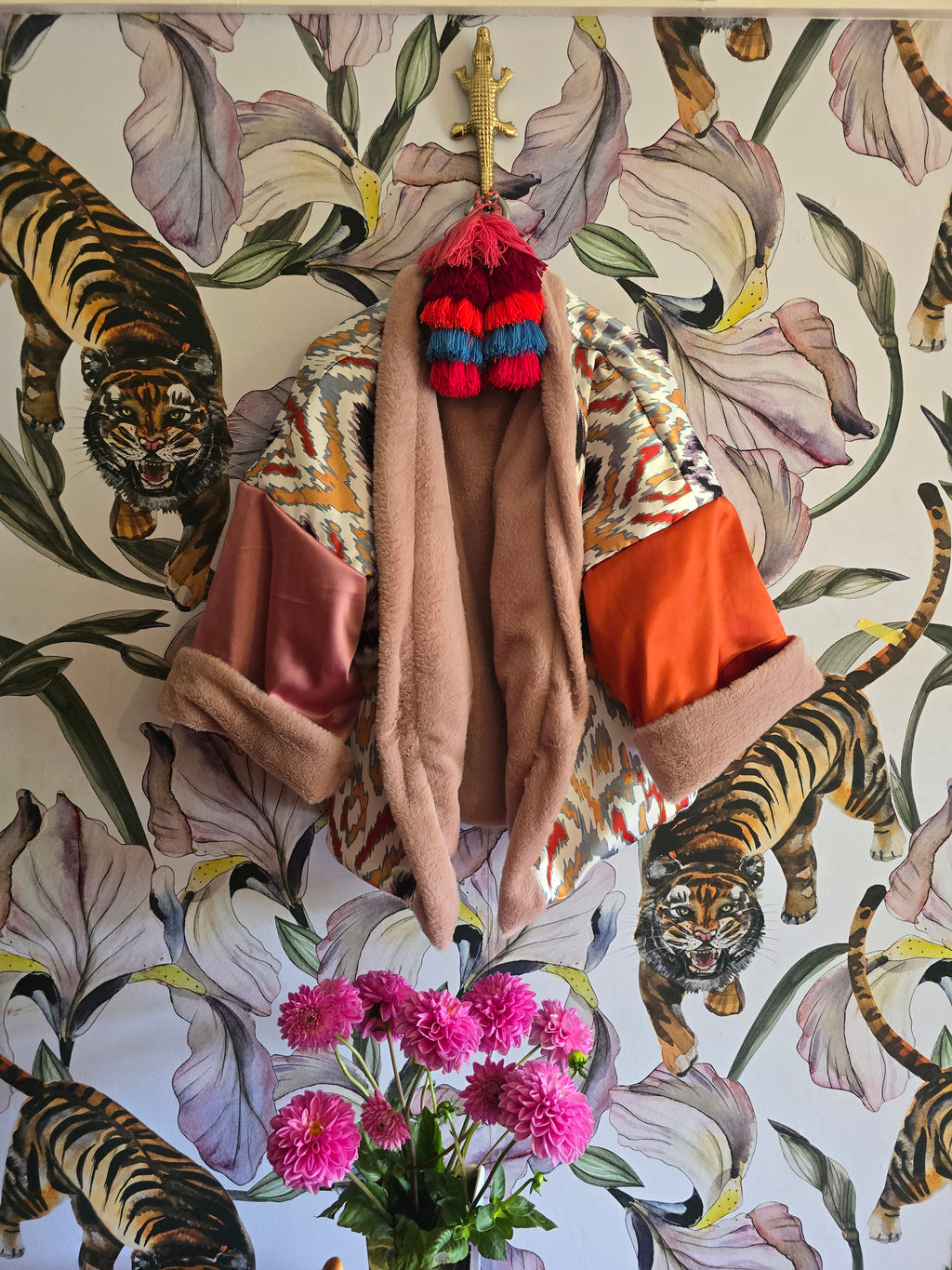 The BLUSHING BABE REVERSIBLE FAUX FUR BOMBER WITH IKAT