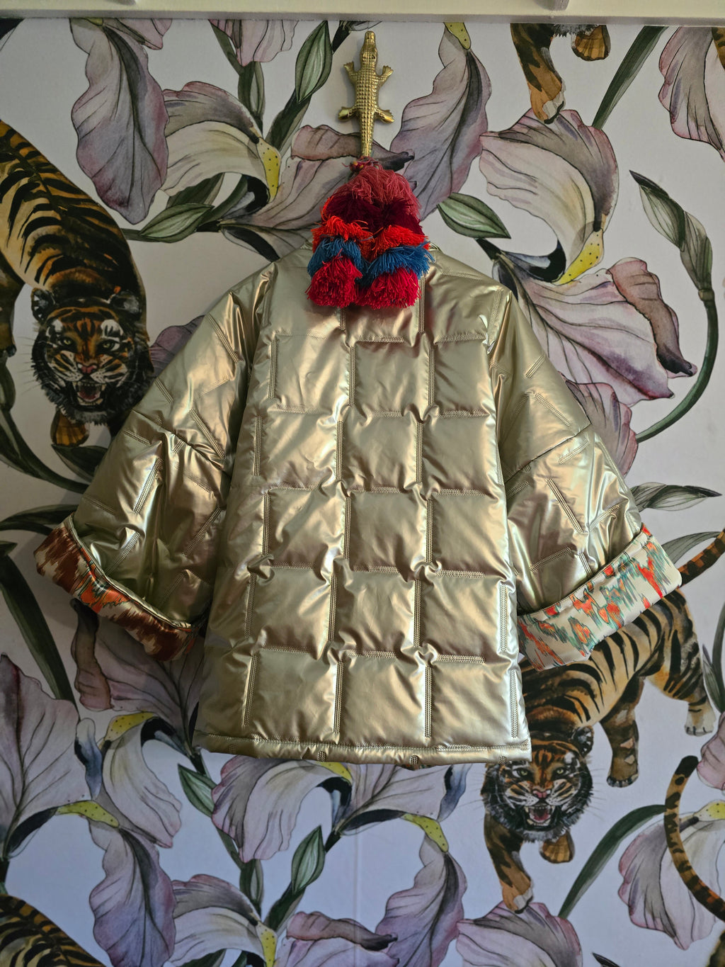 The COOL MOM REVERSIBLE PUFFER IN PEWTER & IKAT ( ONLY ONE )