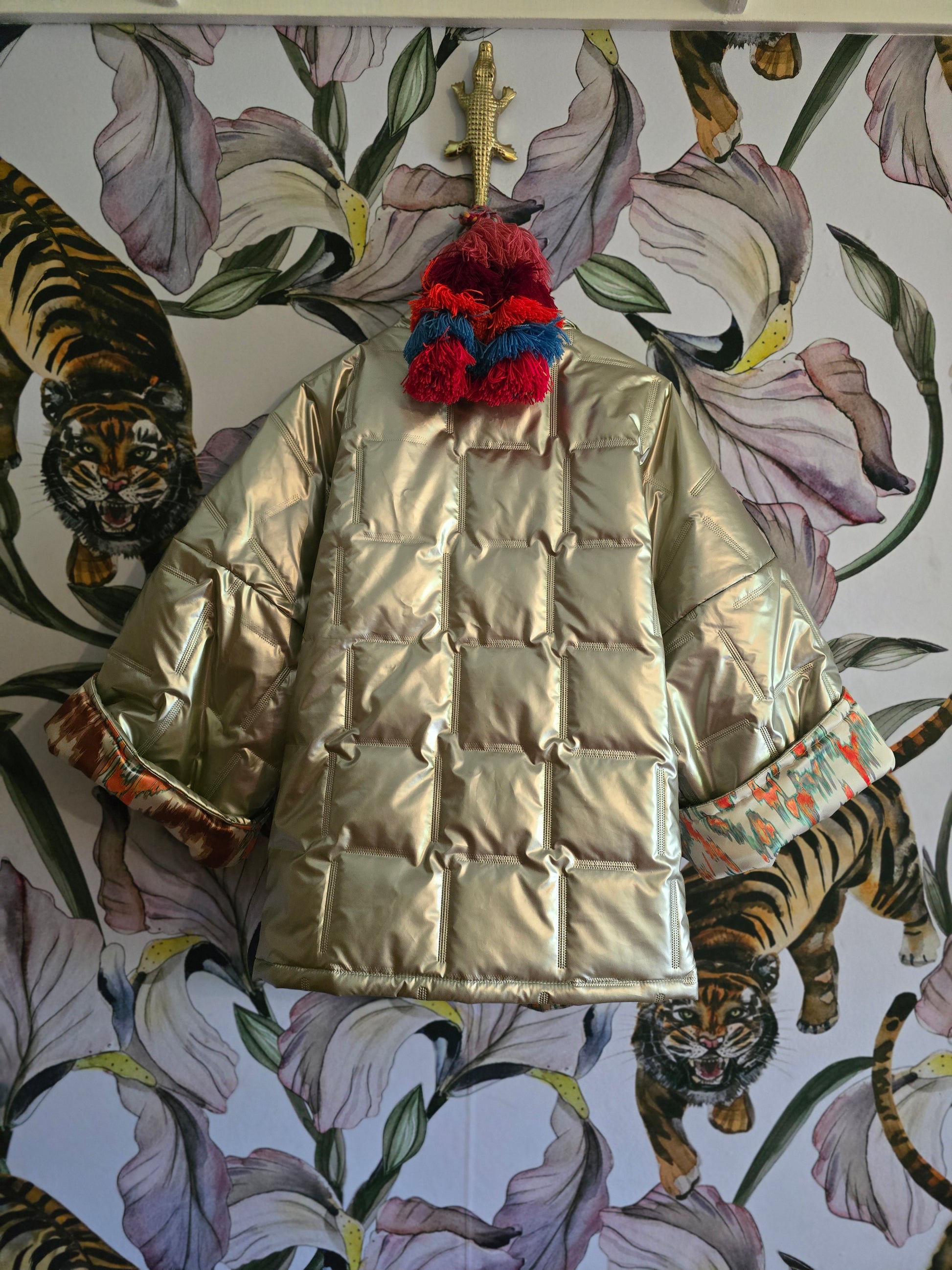 The COOL MOM REVERSIBLE PUFFER IN PEWTER & IKAT ( ONLY ONE )