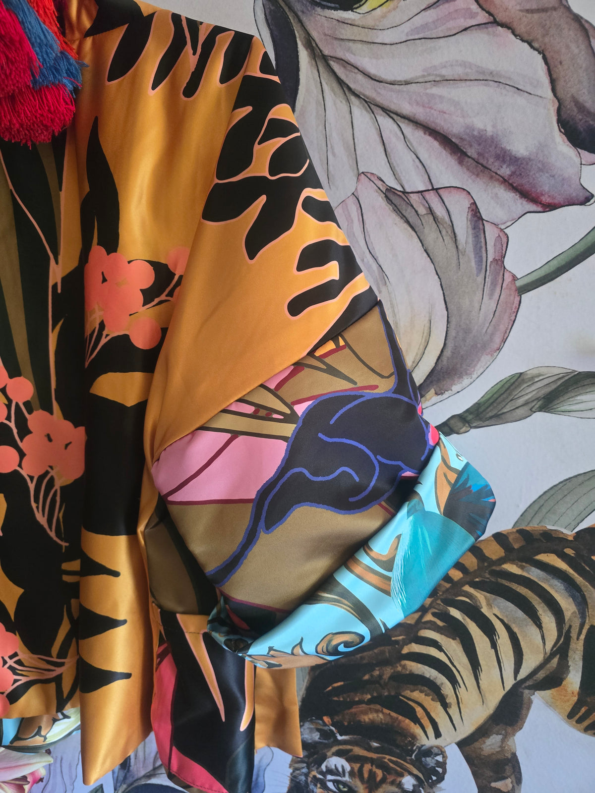 The ELECTRIC JUNGLE FULLY REVERSIBLE DUCHESS SATIN BOMBER