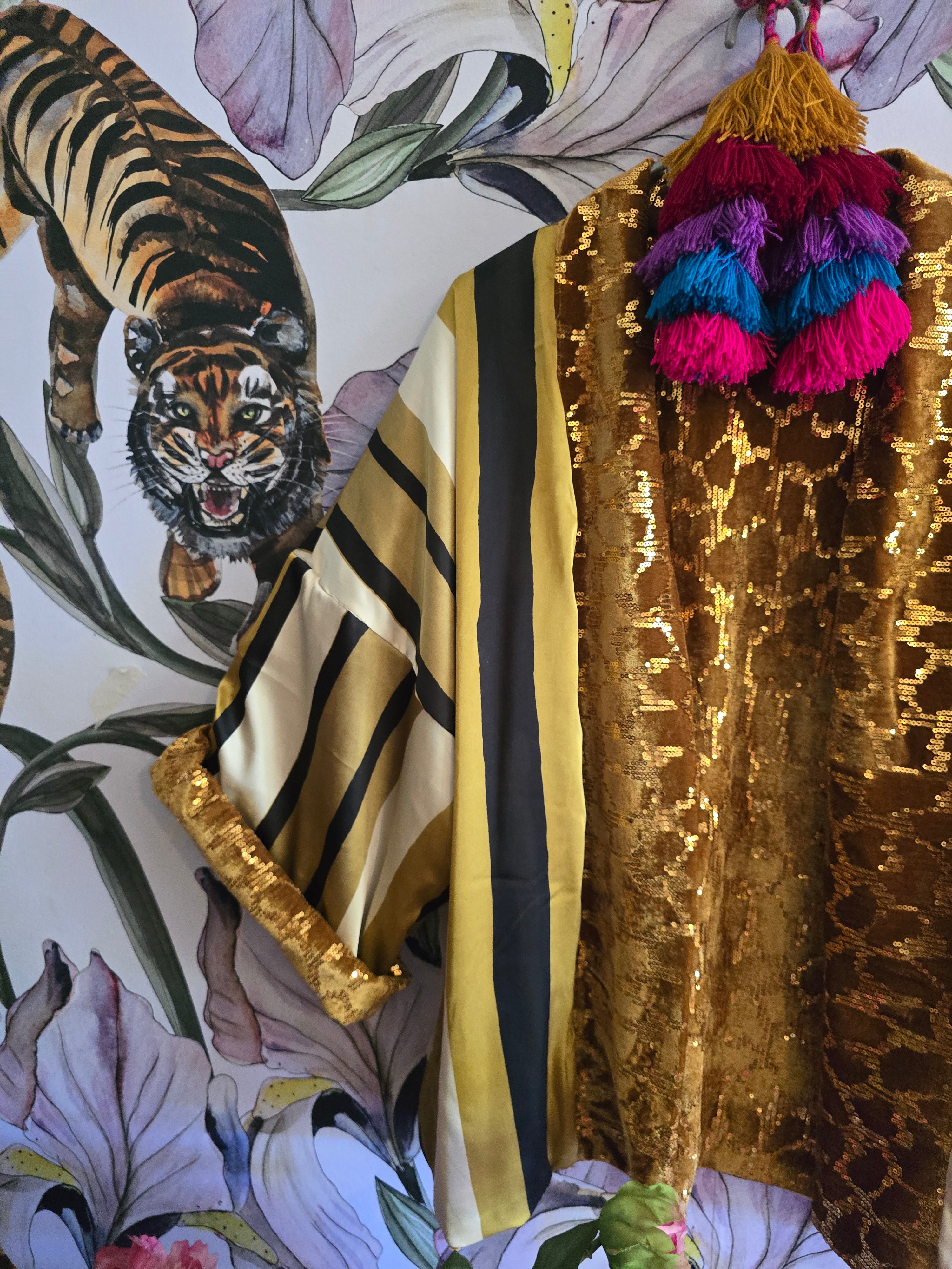 The reversible sparkle and velvet bomber gold
