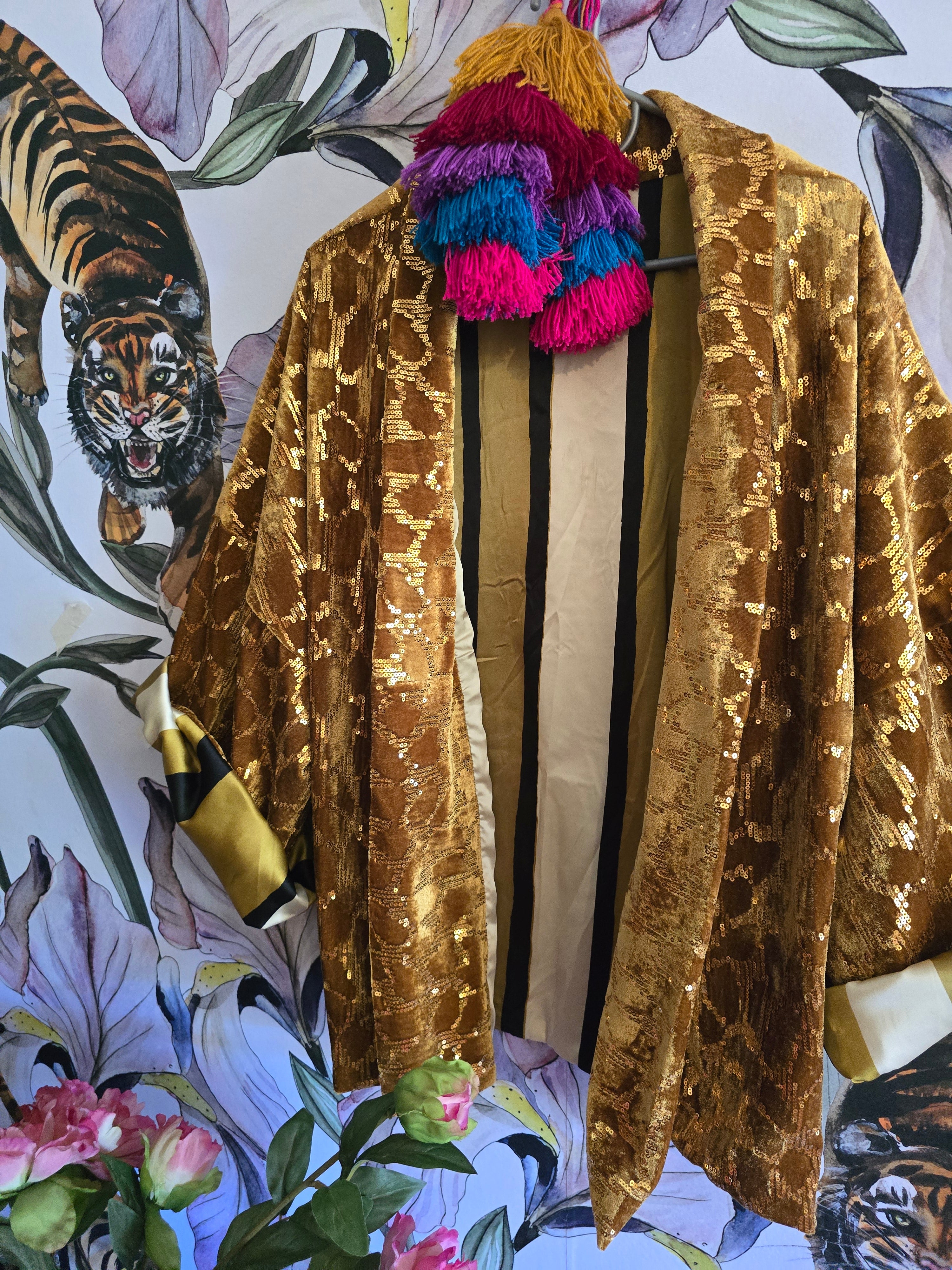 The reversible sparkle and velvet bomber gold