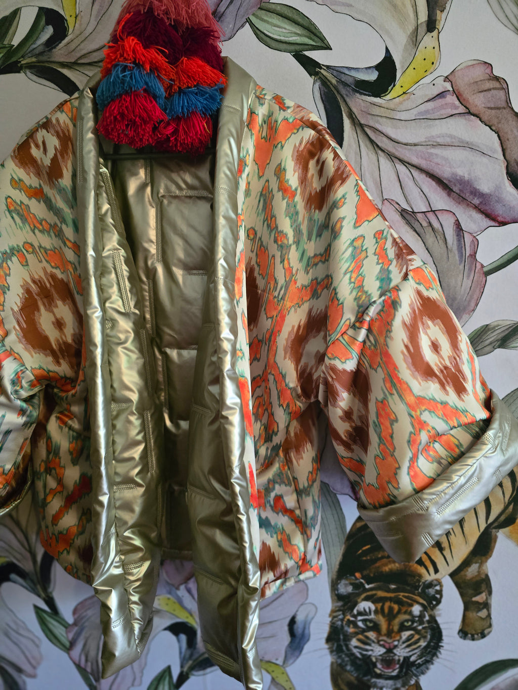 The COOL MOM REVERSIBLE PUFFER IN PEWTER & IKAT ( ONLY ONE )