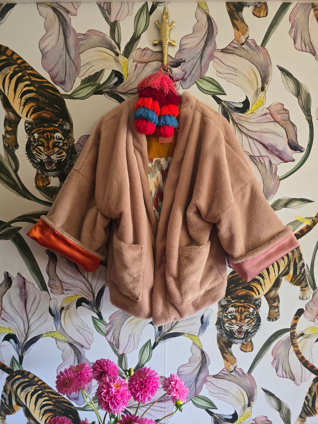 The BLUSHING BABE REVERSIBLE FAUX FUR BOMBER WITH IKAT