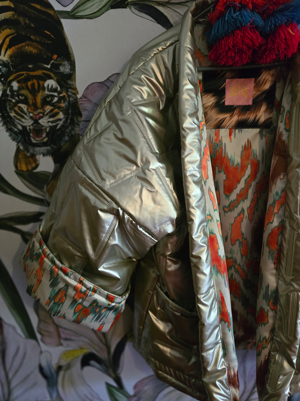 The COOL MOM REVERSIBLE PUFFER IN PEWTER & IKAT ( ONLY ONE )