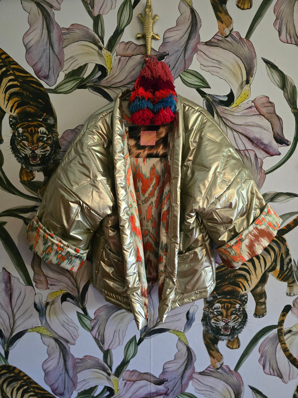 The COOL MOM REVERSIBLE PUFFER IN PEWTER & IKAT ( ONLY ONE )