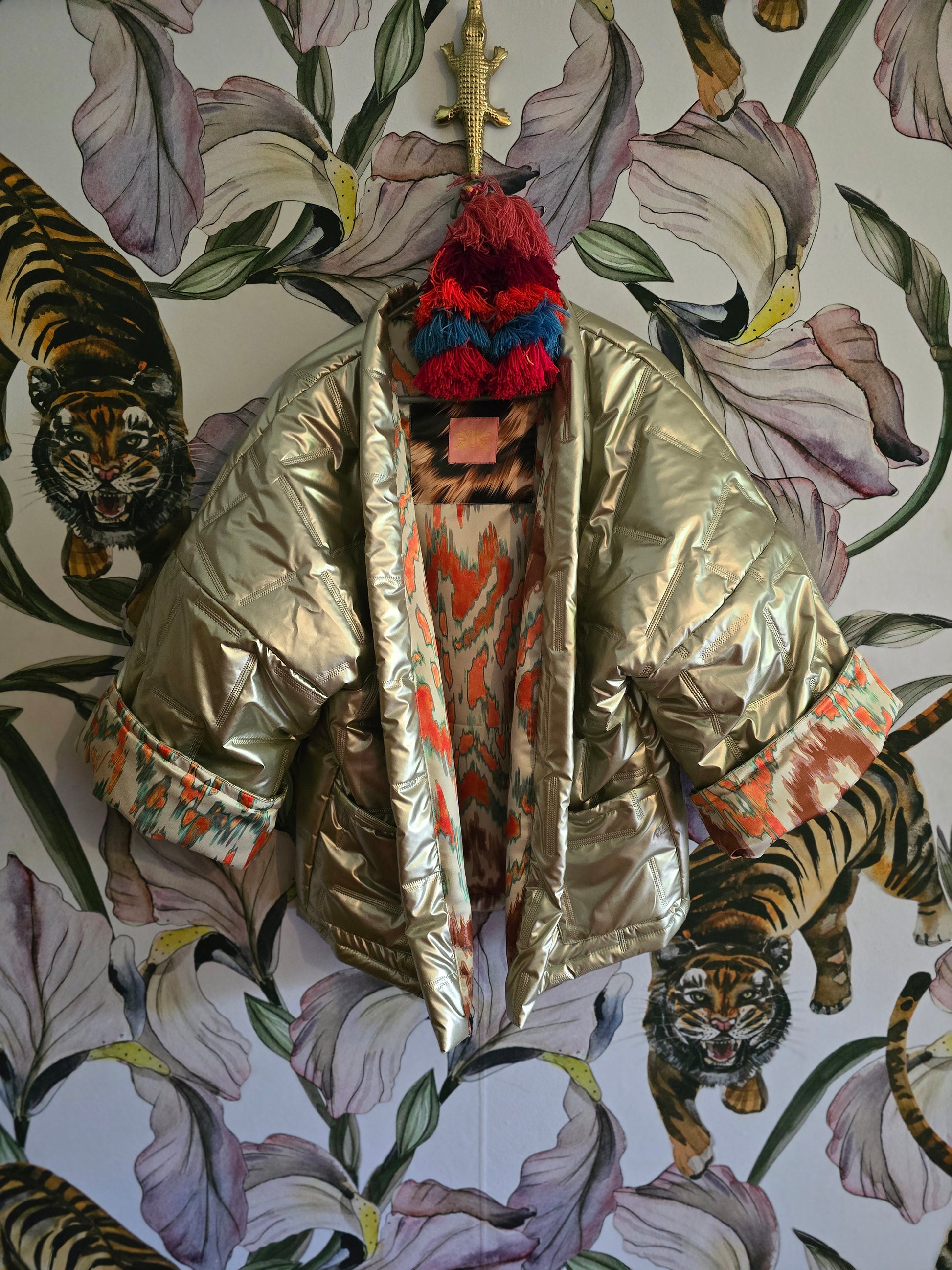 The COOL MOM REVERSIBLE PUFFER IN PEWTER & IKAT ( ONLY ONE )