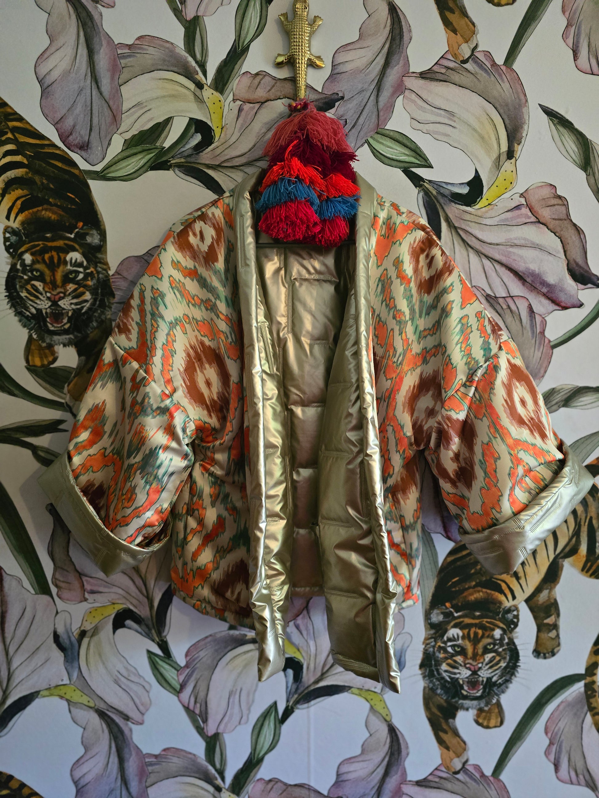 The COOL MOM REVERSIBLE PUFFER IN PEWTER & IKAT ( ONLY ONE )