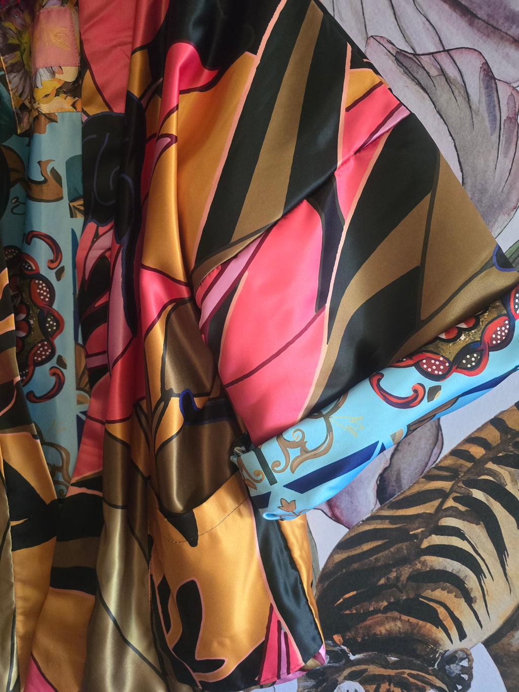The ELECTRIC JUNGLE FULLY REVERSIBLE DUCHESS SATIN BOMBER